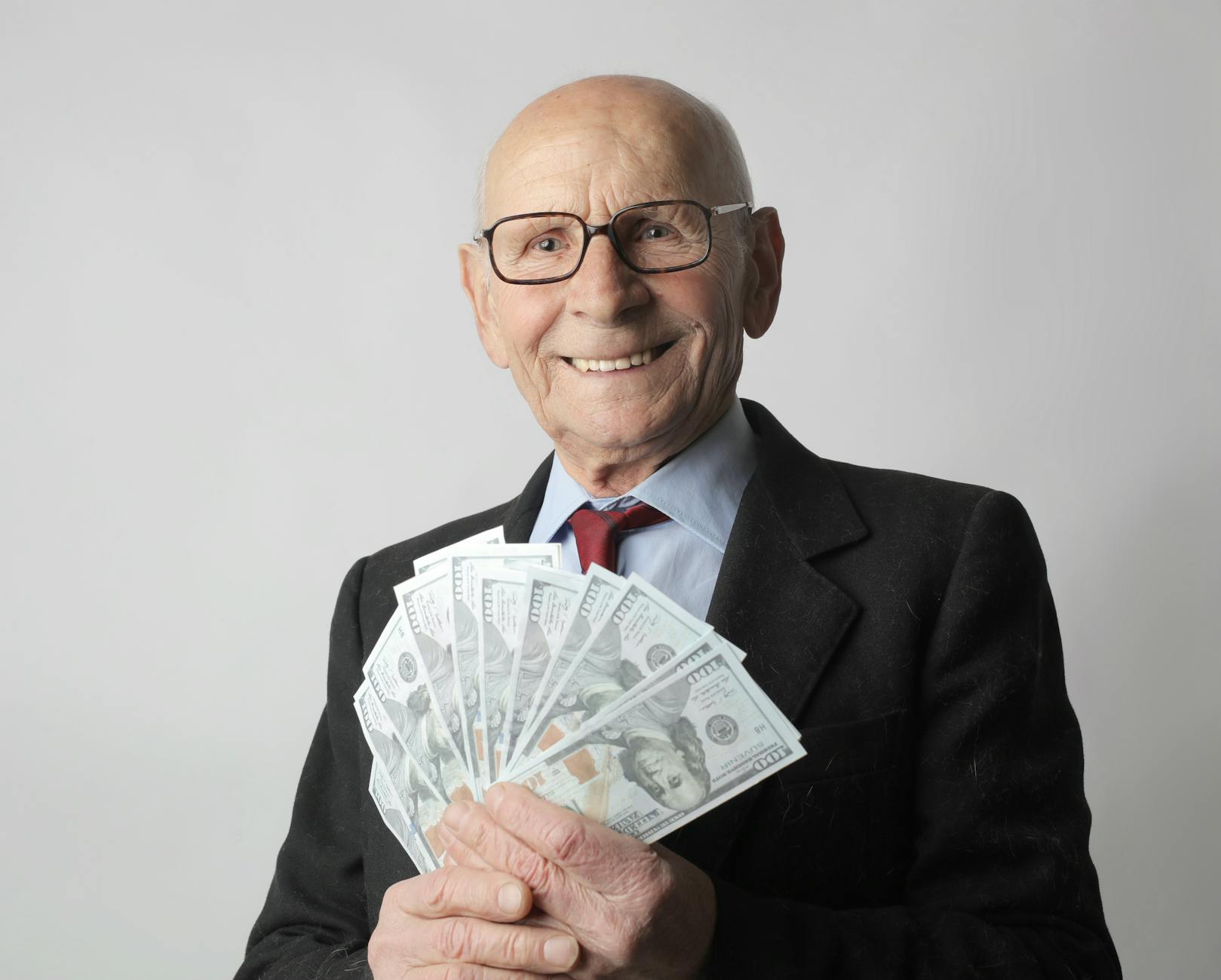 A clean editorial retirement planning scene with long-term savings visuals